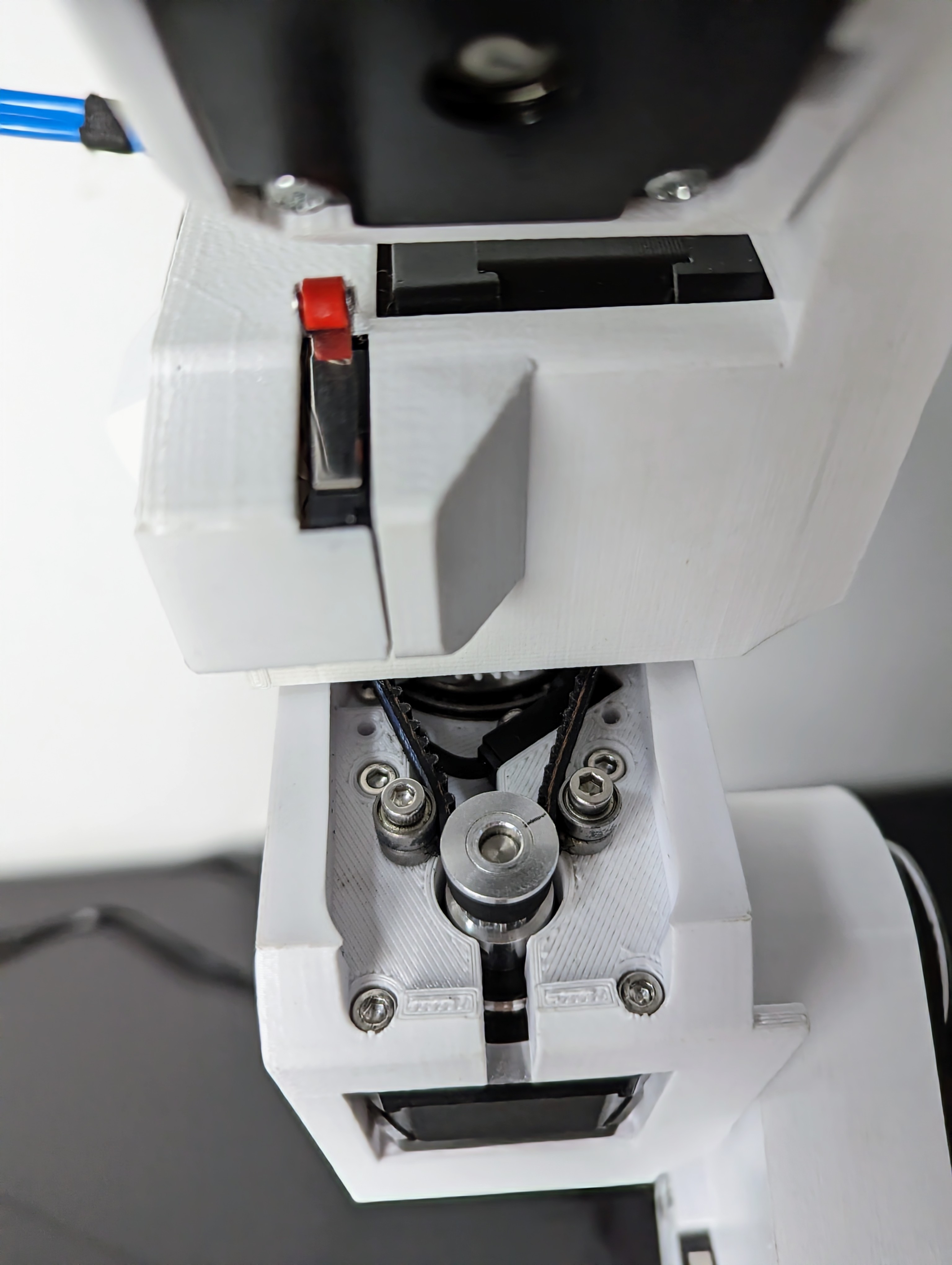 Joint 4 belt location and tensioning